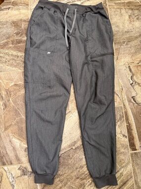 Fabletics Ion Scrub Pants in the color Heather Grey-Medium